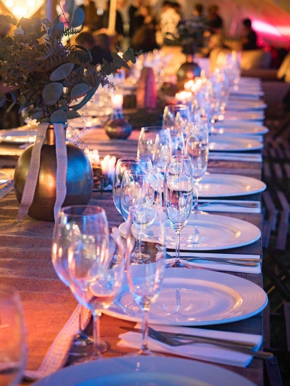 Elegant candlelit dinner table setup for premium catering in Punta Cana